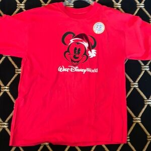 Brand new WALT Disney World T-shirt in red. Adult size medium.